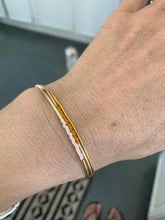 Load image into Gallery viewer, Stackable gold/silver tube bracelets.