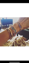 Load image into Gallery viewer, Stackable gold/silver tube bracelets.